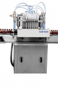 BOTTLE FILLING WITH LABELING MACHINE