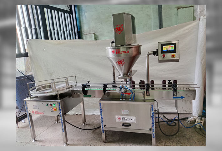 Double Head Auger Powder Filler.